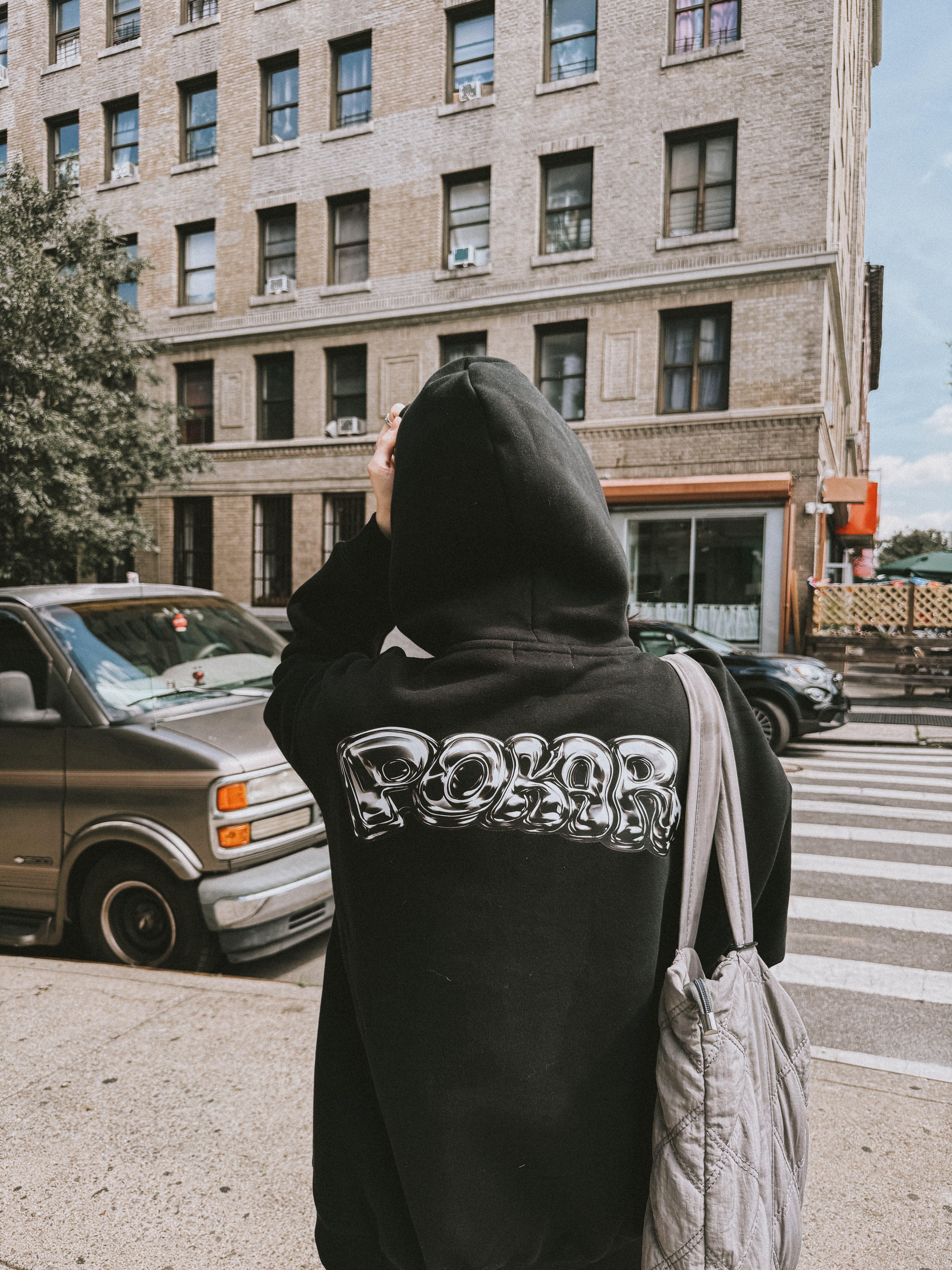 POKAR black hoodie photographed in New York