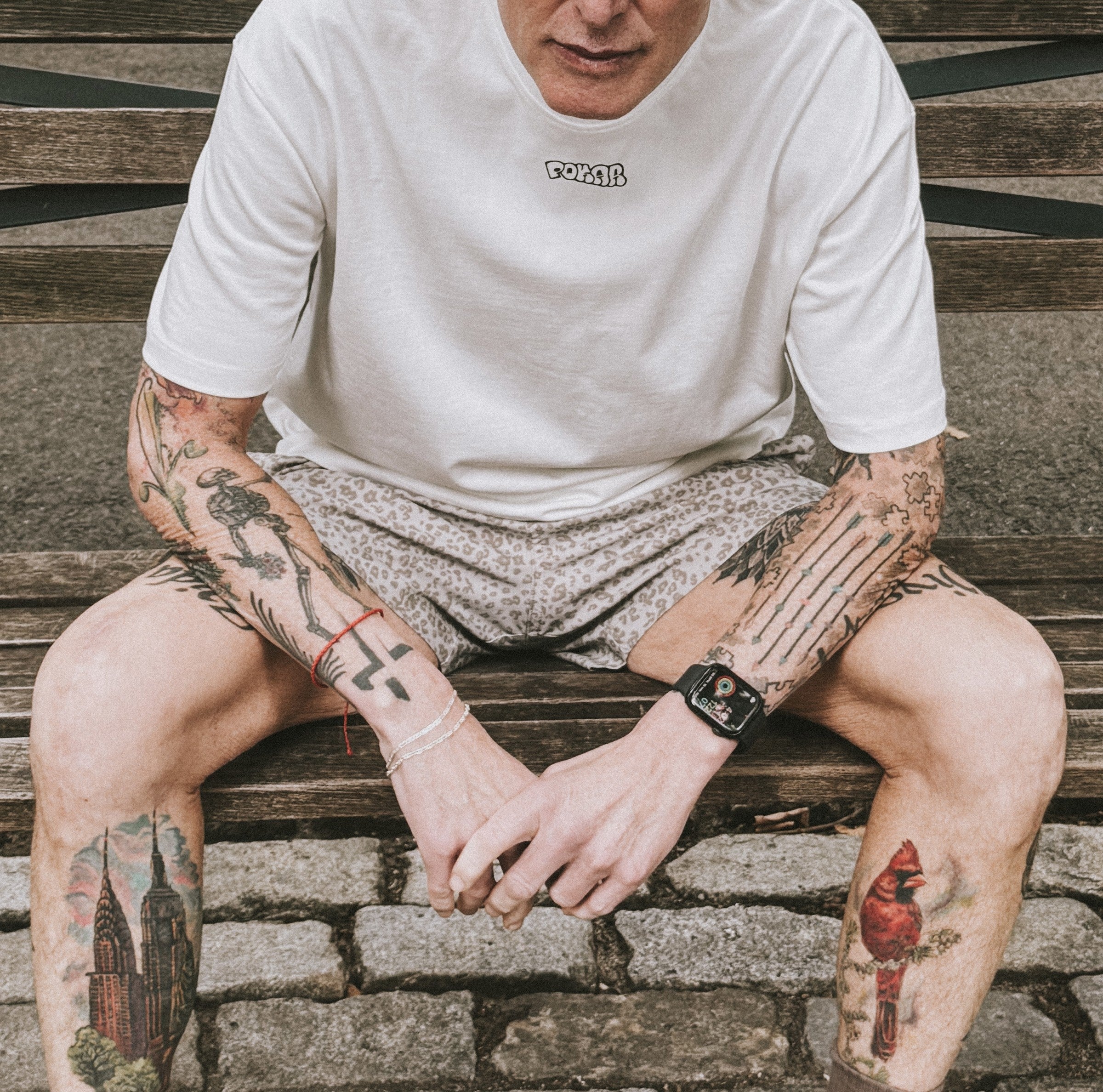 POKAR white tee portrait on New York steps